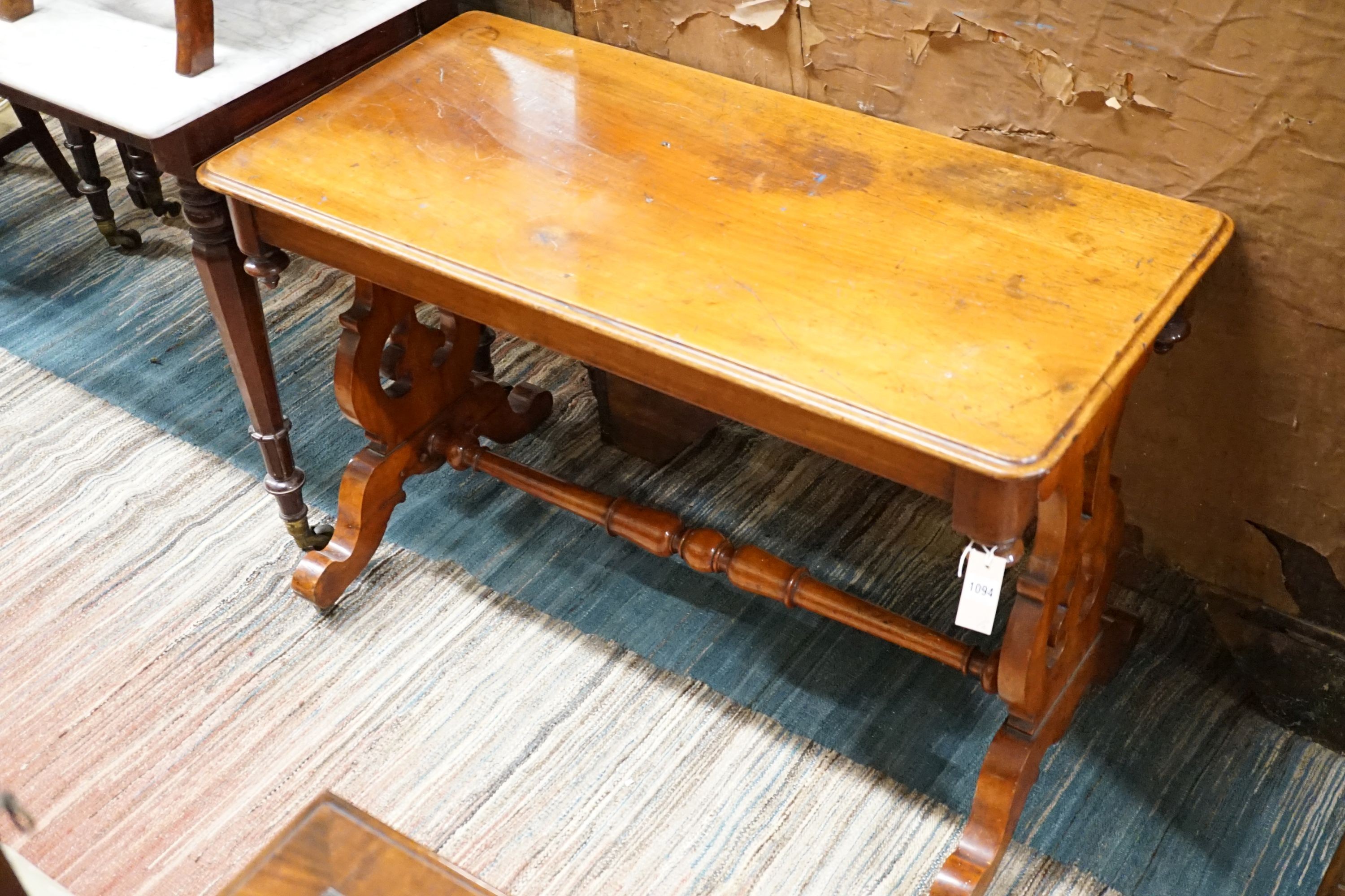 A late Victorian mahogany centre table, width 106cm, height 71cm and a Victorian mahogany centre table with associated broken marble top, width 109cm, height 56cm